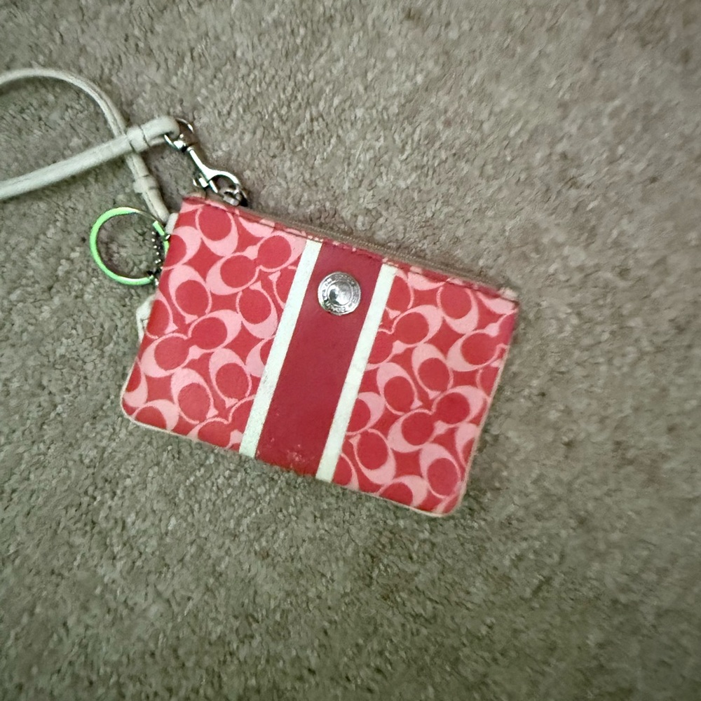 Coach orange and White Patterned Wristlet